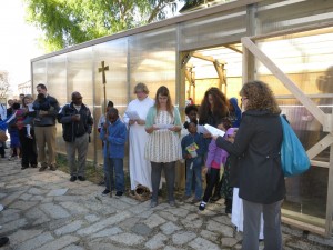 Blessing the new greenhouse and courtyard.